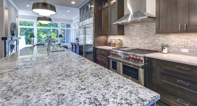 kitchen-countertops-gray-granite-and-white-quartz-kitchen-remodeling-product-selection-houston